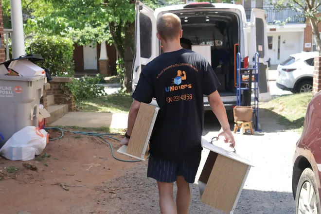 UMovers mover carrying furniture